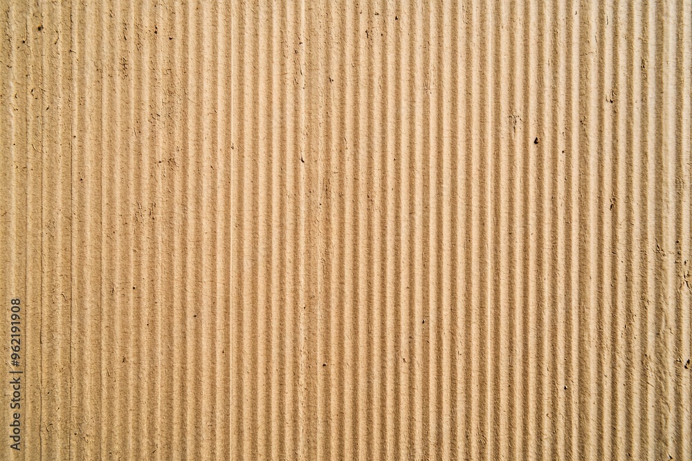 Light Brown Cardboard Texture with Vertical Lines and Subtle Imperfections for Packaging. AI generated illustration Light Brown Cardboard Texture with Vertical Lines and Subtle Imperfections for Packaging. AI generated illustration