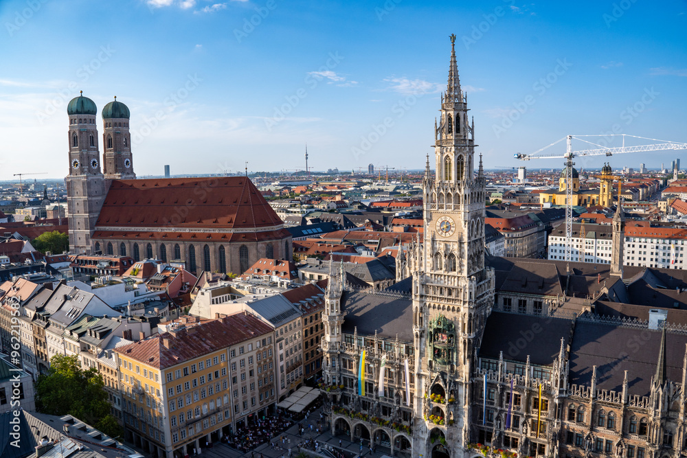 Fototapeta premium Panoramic view from the tower of the old Peter with the new town hall and the Frauenkirche in the old town of Munich, Bavaria, Germany