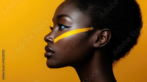 Striking Profile Portrait of a Woman with Bold Black and Yellow Color Scheme, Featuring a Yellow Stripe on Her Face, Black Background, and Yellow Backdrop