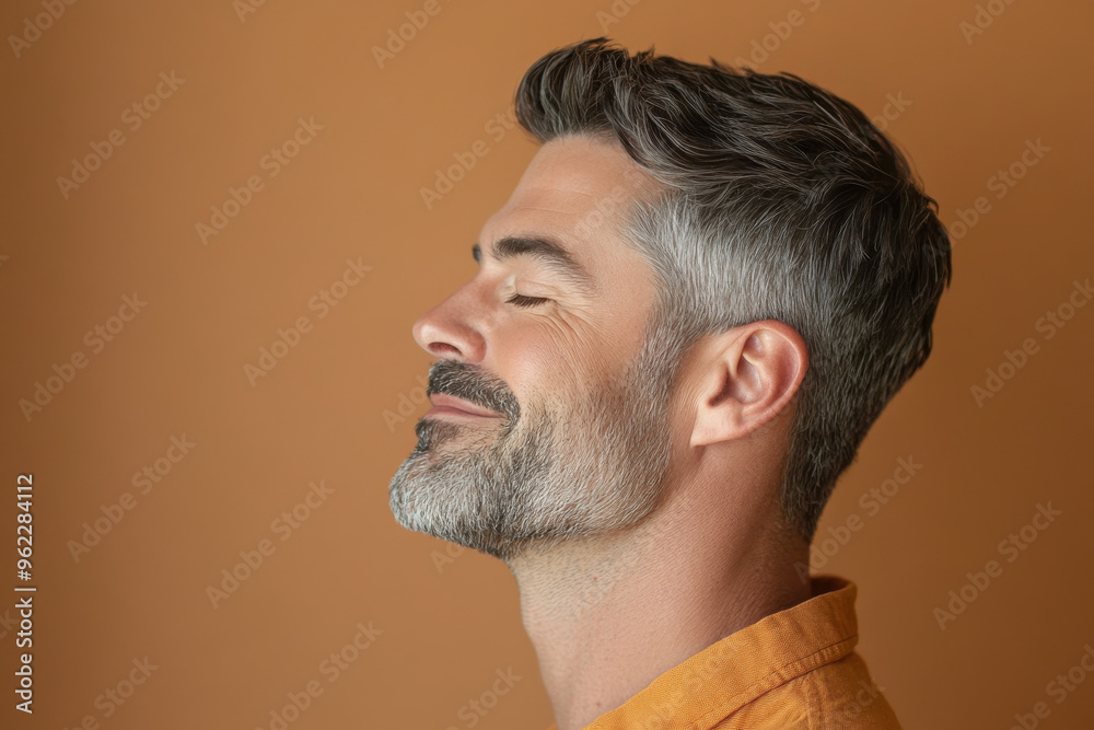 Obraz premium a close up of a man's face looking to a side