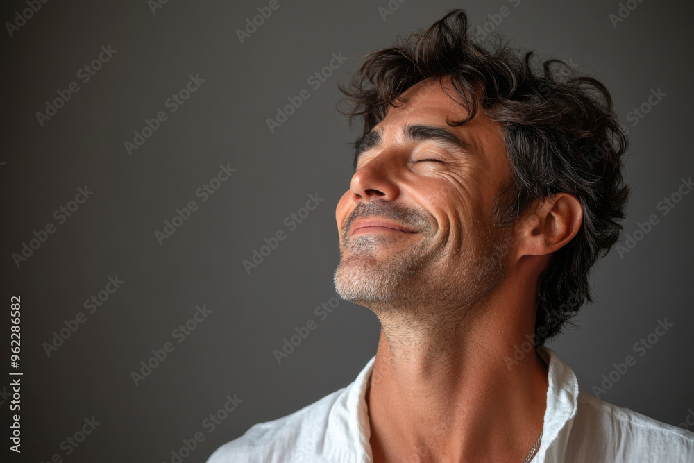 a close up of a smiling man's face a close up of a smiling man's face