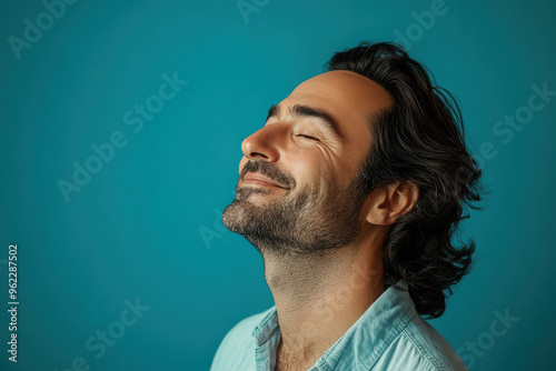 a close up of a smiling man's face