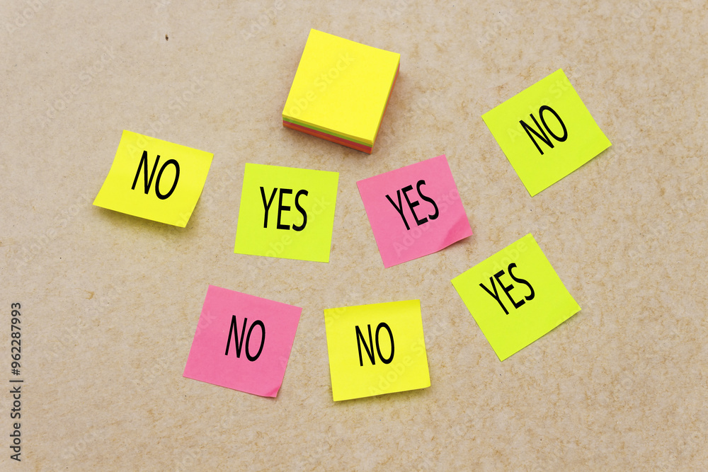 yes and no on colorful sticky note on beige background yes and no on colorful sticky note on beige background