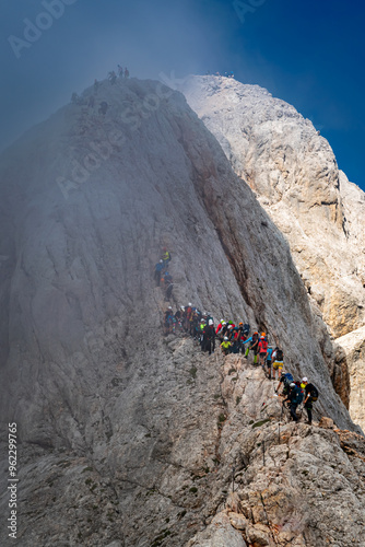 Mountain ridge full of hikers - Triglav, Slovenia