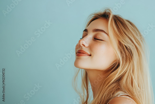 a close up of a blond woman's face