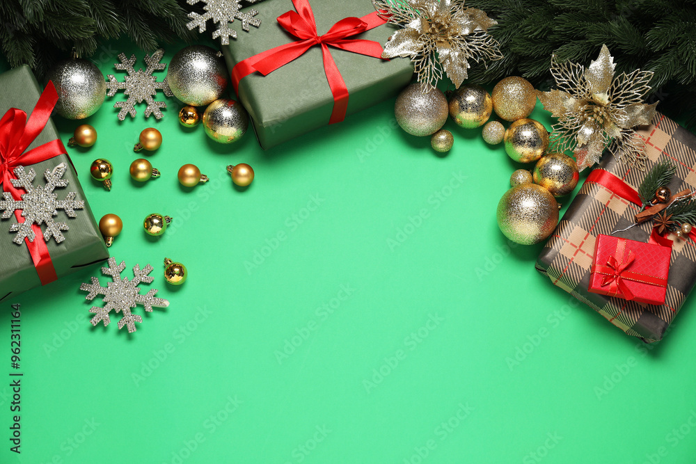 Different Christmas decor and gift boxes on green background, flat lay. Space for text Different Christmas decor and gift boxes on green background, flat lay. Space for text