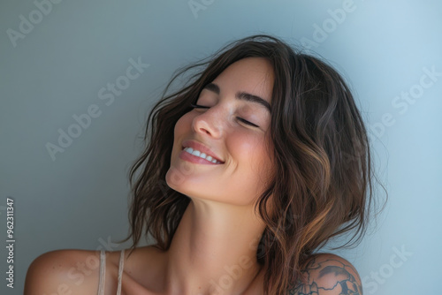 a close up of a smiling woman's face