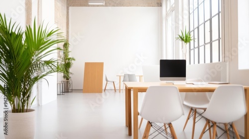 Productive work session in a bright, open co-working space with ergonomic furniture, natural light, and creative energy