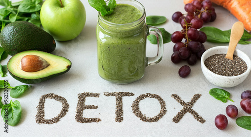 Smoothie detox with ingredients like avocado spinach and grapes in a healthy lifestyle setting