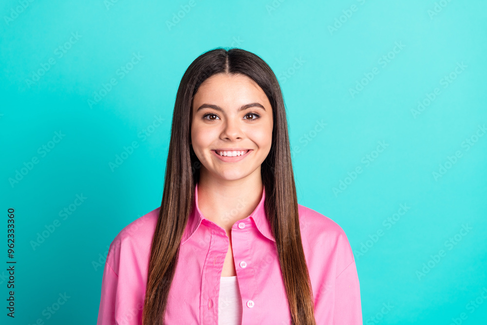 Photo portrait of pretty teen girl toothy smile cheerful wear trendy pink outfit isolated on aquamarine color background Photo portrait of pretty teen girl toothy smile cheerful wear trendy pink outfit isolated on aquamarine color background