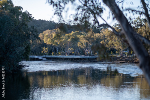 The Murray River, the longest river in Australia, flows through the city of Albury, in New South Wales, part of the twin city of Albury-Wodonga, located on the Hume Highway. At golden hour sunset. 