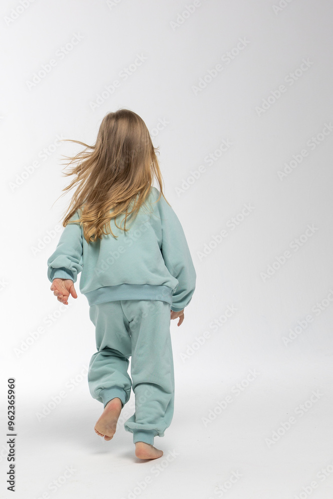 Portrait of beautiful cute little toddler girl. Child with funny face. Pretty smile kid in studio on white background. High quality photo Portrait of beautiful cute little toddler girl. Child with funny face. Pretty smile kid in studio on white background. High quality photo