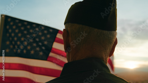 Elderly Man Stand Against American Flag For Veterans Day Holiday