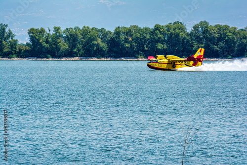 Firefighting plane skimming Lake Kerkini in Greece photo