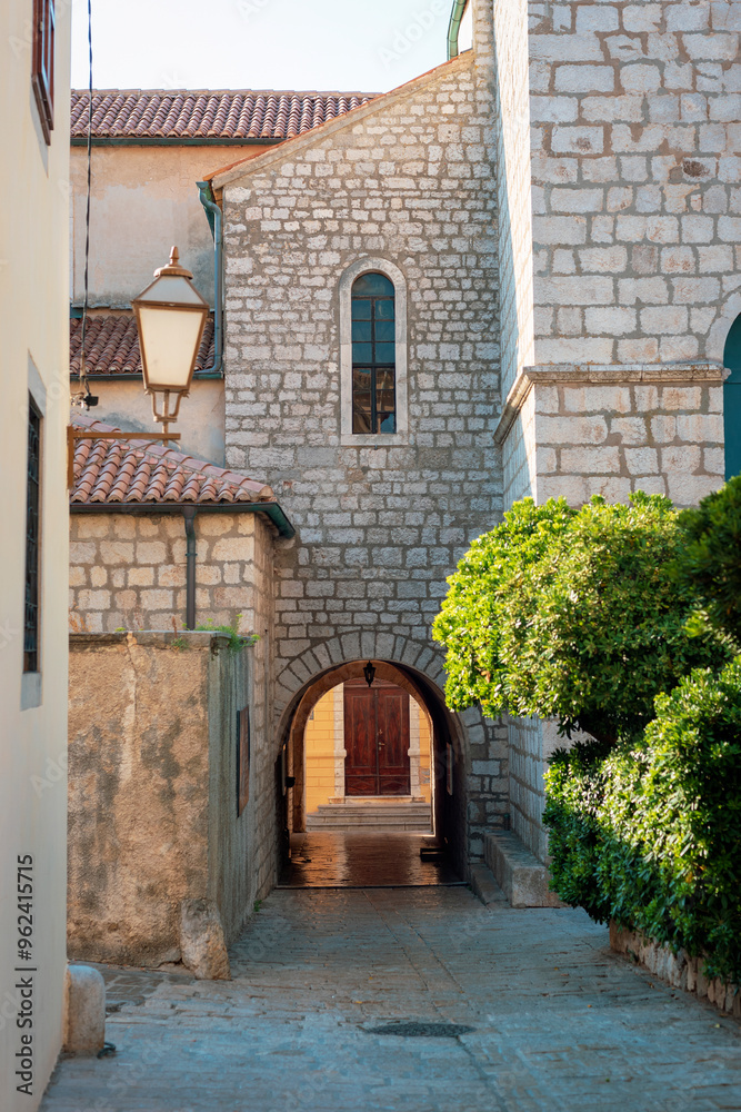 Fototapeta premium Steet passage view in old town of Krk, Krk island, Croatia