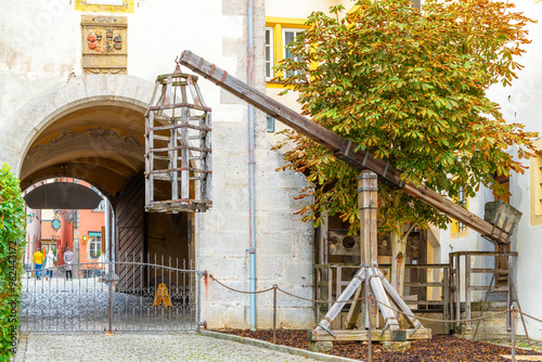 A medieval wooden gibbet cage is suspended above ground near the Museum of Torture in the Bavarian village of Rothenburg ob der Tauber, Germany.