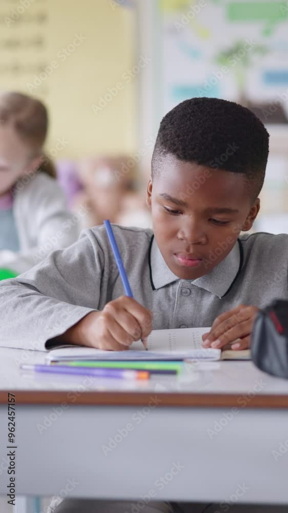 Boy, child and math test in classroom, counting fingers and kindergarten assessment for education. Male person, exam and lesson for mind development of pupil, problem solving and answer in workbook Boy, child and math test in classroom, counting fingers and kindergarten assessment for education. Male person, exam and lesson for mind development of pupil, problem solving and answer in workbook