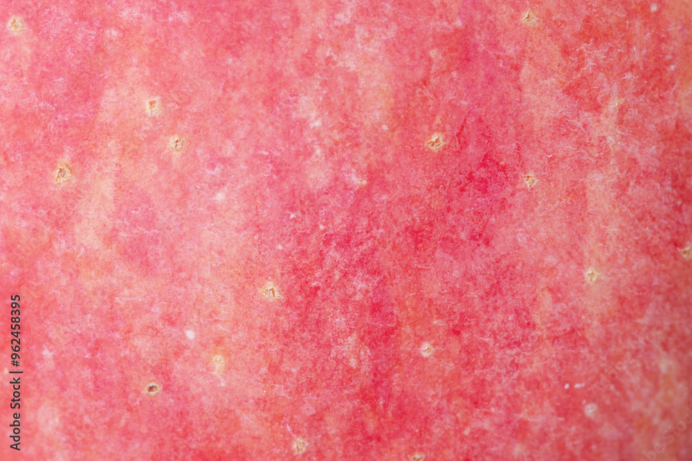 Macro photo of the texture of a light red and yellow apple. Apple as a background Macro photo of the texture of a light red and yellow apple. Apple as a background