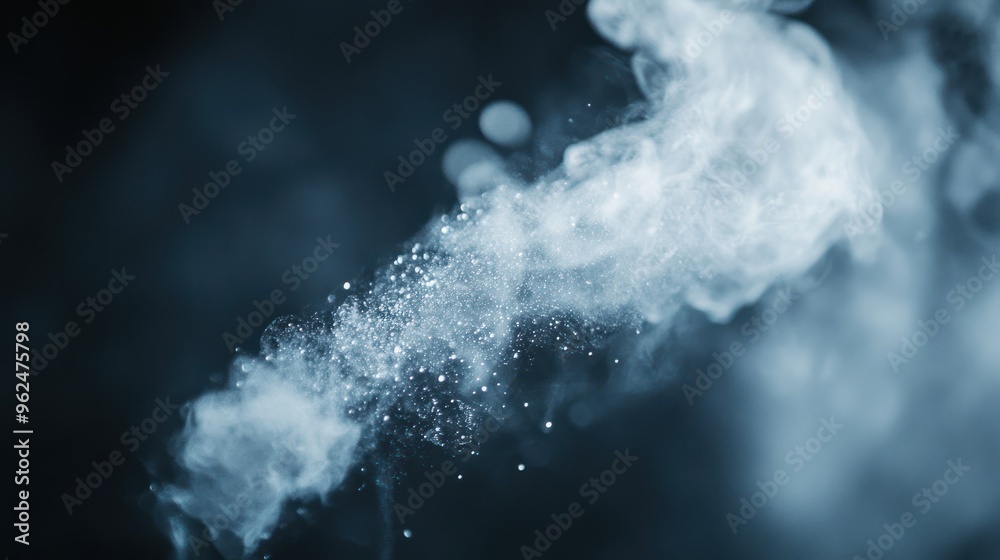 White Smoke and Water Droplets Against a Dark Blue Background White Smoke and Water Droplets Against a Dark Blue Background