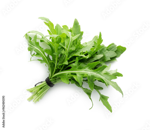 Bunch of fresh arugula leaves isolated on white, top view