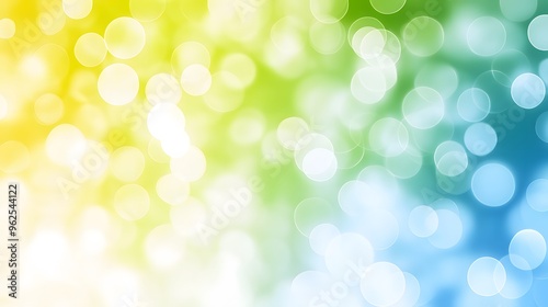 A soft, dreamy bokeh background with overlapping circles in pastel shades of blue, green, and yellow. The abstract light effect creates a soothing and airy atmosphere, perfect for serene designs.