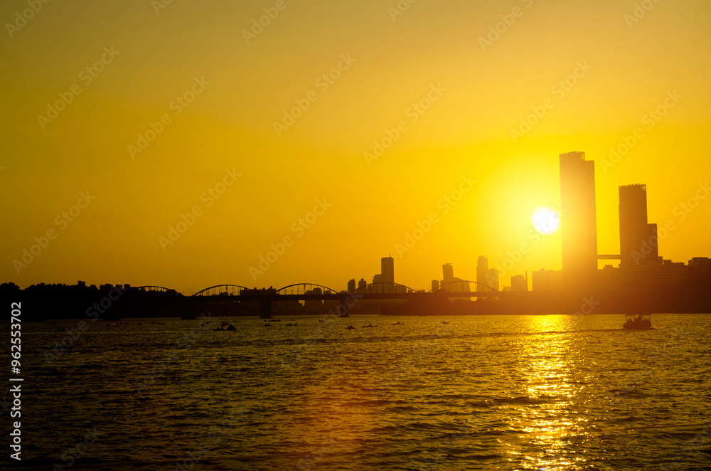 Beautiful Colorful Sunset of the 63 building in harmony with Han river. Beautiful Colorful Sunset of the 63 building in harmony with Han river.