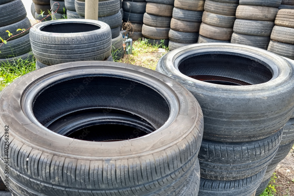 Piles of old and used tires risk collecting rain water in tropical climate and become breeding place for aedes mosquitoes, carrier of dengue virus. Piles of old and used tires risk collecting rain water in tropical climate and become breeding place for aedes mosquitoes, carrier of dengue virus.
