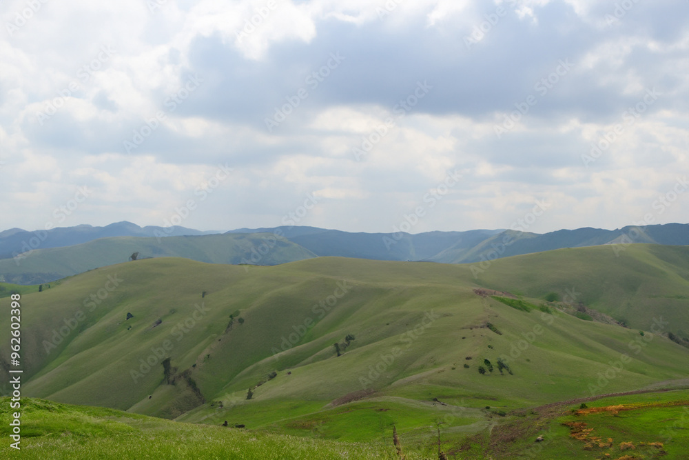Naklejka premium Hills Landscape Background