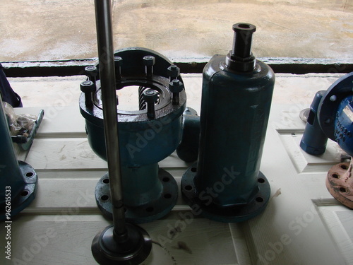 Bintulu, Malaysia - November 8, 2006: The machineries, equipment, production line, working conditions and general view of the manufacturing environment within a Medium Density Fiberboard factory and p photo