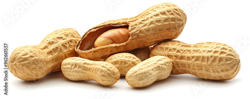 A collection of whole peanuts in their shells and a few without shells, arranged on a white background