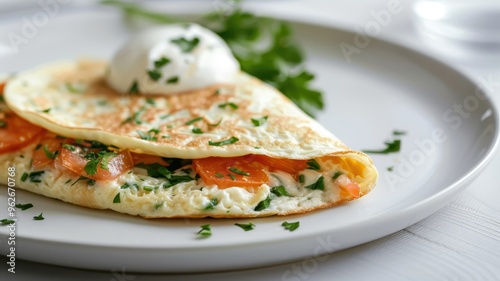 A fluffy omelet filled with colorful vegetables and melted cheese.