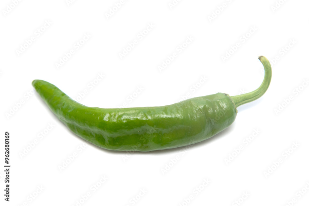 A green pepper is shown on a white background A green pepper is shown on a white background