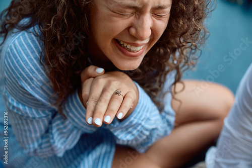 Young woman feeling emotional after getting engaged.