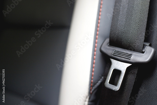 Close Up of fastening seat safety belt in car for before driving on the road. concept transport travel safety. soft focus.