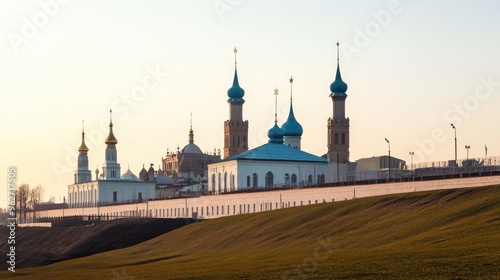 Kazan Kremlin's historic buildings under a clear sky, with no visitors in sight.