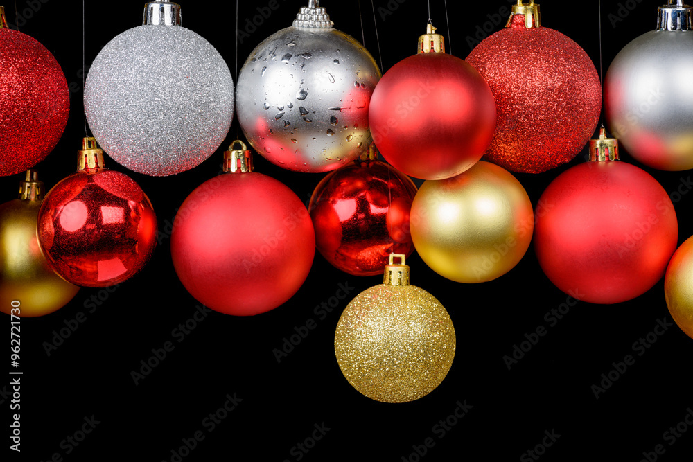 Closeup of shiny Christmas balls against a black background Closeup of shiny Christmas balls against a black background