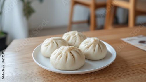 steamed buns on a plate on a wooden table, kitchen background, Ai generated image