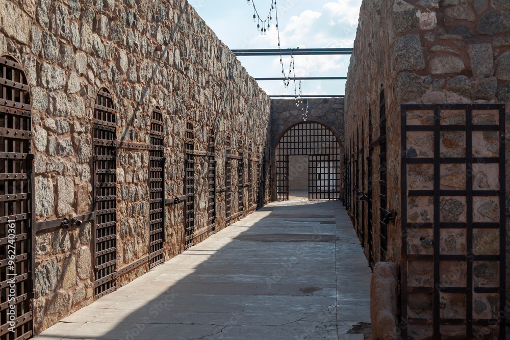 Prison Rocks Yuma Territorial Prison rock walls and iron gates Stock Photo | Adobe Stock