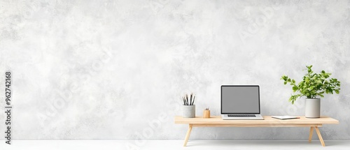 A modern telecommuting setup in a zerowaste office, featuring a desk with recycled materials The background highlights a minorityowned business with a blank wall ready for text photo