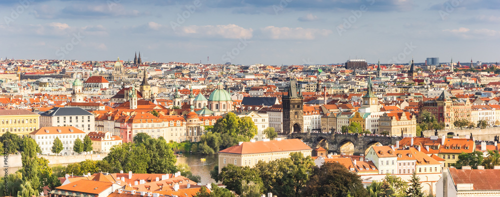 Panoramic view over the river Moldau (Vltava) and historic Charles bridge in Prague, Czechia