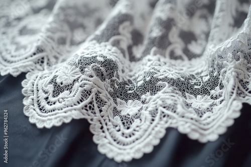 Delicate lace ornament on a dark fabric backdrop with intricate patterns and fine details in soft diffused lighting for a high-quality natural look