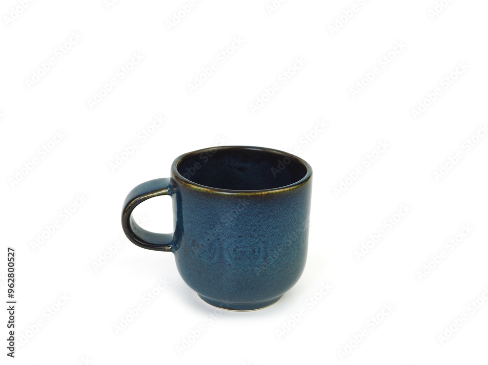 Empty dark blue mug isolated on white background. Use for home or restaurant, food design. Concept kitchen utensils and tableware. Side view.. Empty dark blue mug isolated on white background. Use for home or restaurant, food design. Concept kitchen utensils and tableware. Side view..