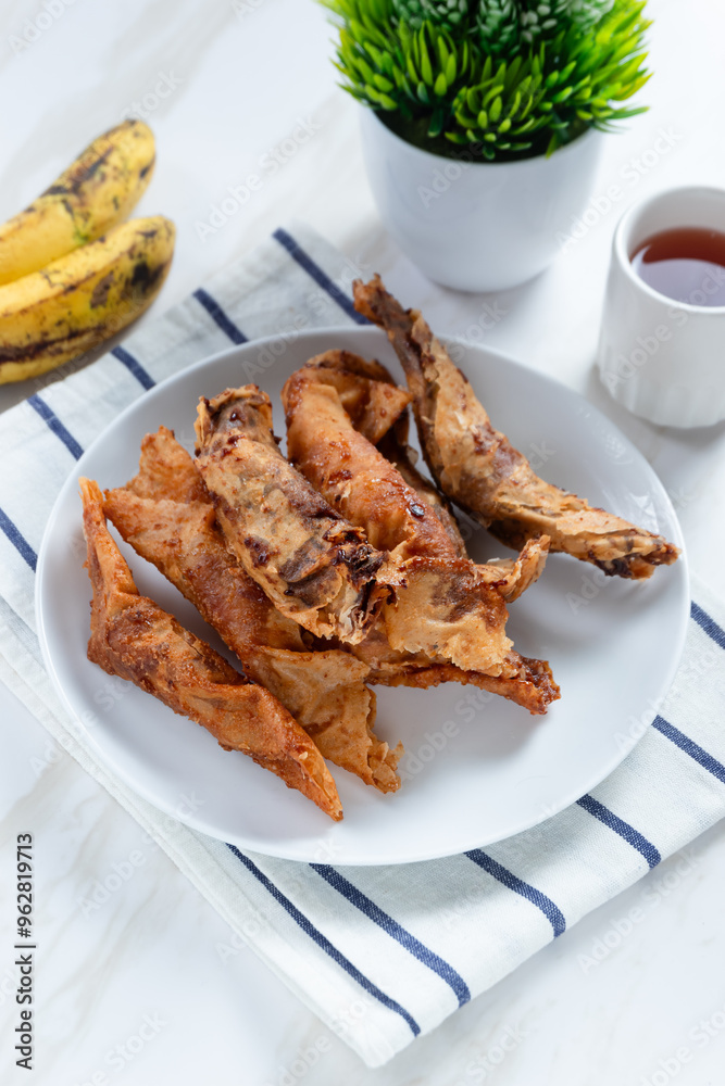 Pisang Aroma or Pisang Cokelat (Piscok), Indonesian traditional snack. Made of banana, chocolate and sugar wrapped in flour sheet. Perfect for recipe, article, catalogue, commercial. 