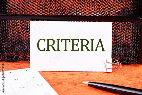 Criteria Controlling Follow Guidelines Conduct Concept. Criteria word on a white business card close-up photo