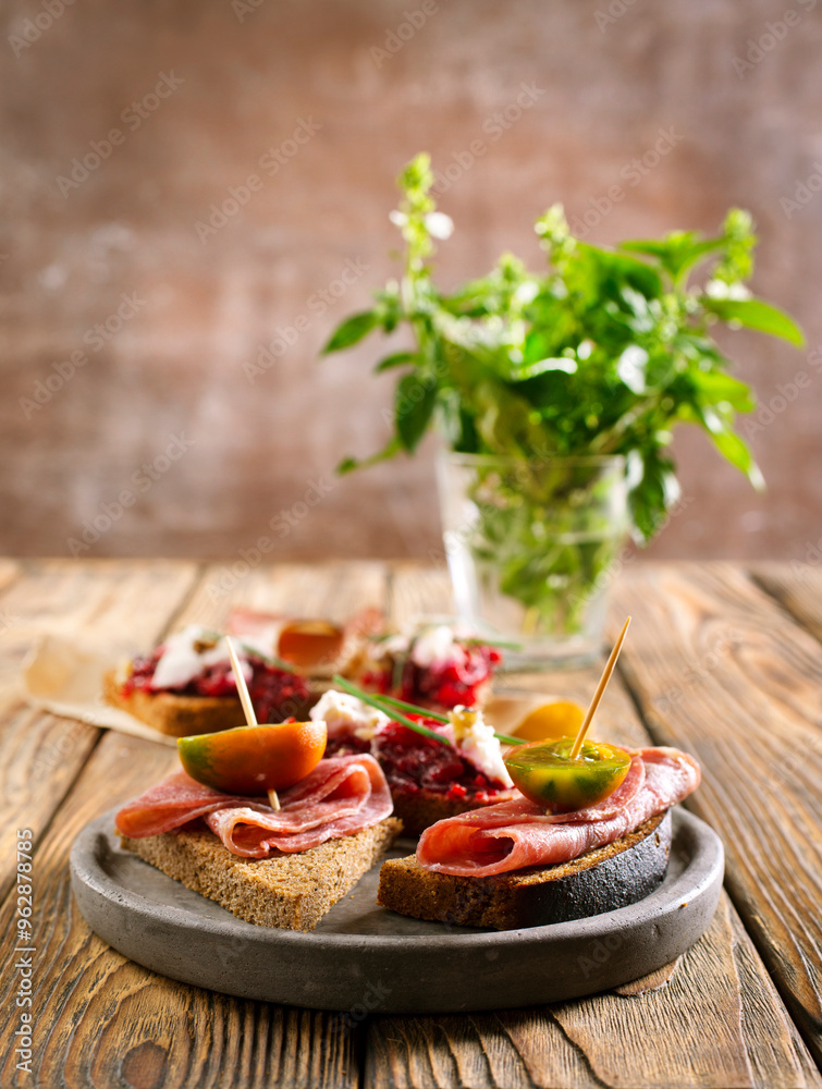 Traditional Spanish Jamon Serrano ham, Prosciutto Crudo, Parma ham, Italian antipasto Traditional Spanish Jamon Serrano ham, Prosciutto Crudo, Parma ham, Italian antipasto
