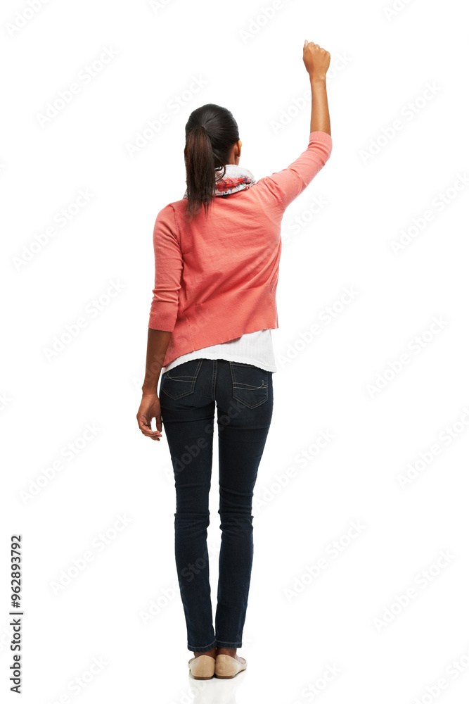 Woman, protest and fist in studio with white background for rally, human rights and gender equality. Female person, hands and back for justice, revolution and peace with fight, voice or demonstration