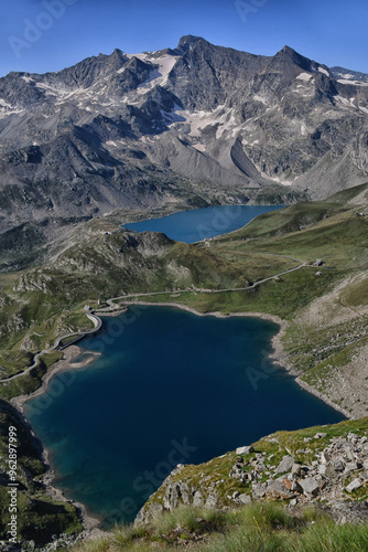 The colorful waters of the dams of Lake Serrù and Lake Agnel, seen from the road of the Nivolet pass.