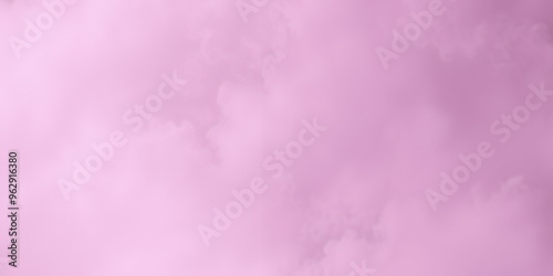 Soft pink clouds create a dreamy backdrop. copy space