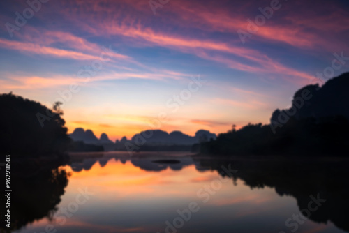 Blur image of Nong Thale lake and karst mountain at dawn, Krabi