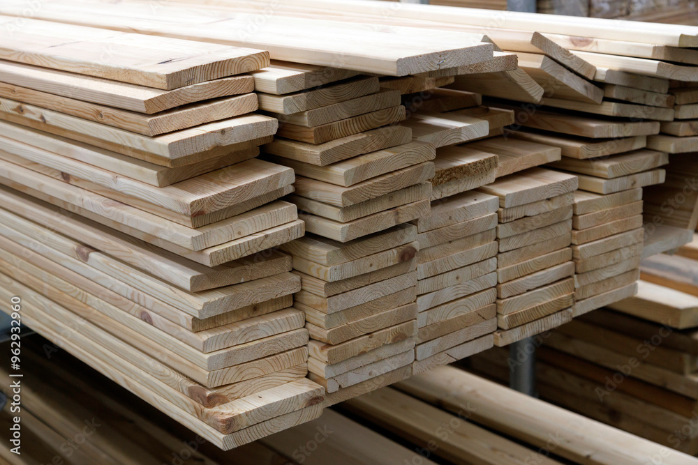 floor boards stack in a warehouse or market, closeup. floor boards stack in a warehouse or market, closeup.